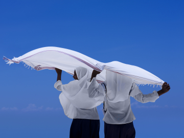 Girls on Nungwi beach in Zanzibar, Tanzania on February 12, 2009.