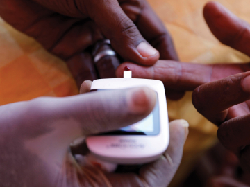 A doctor gives a free blood sugar test on World Diabetes Day in Khartoum, Sudan on Nov. 14, 2019. Mohamed Khidir/Xinhua via Getty