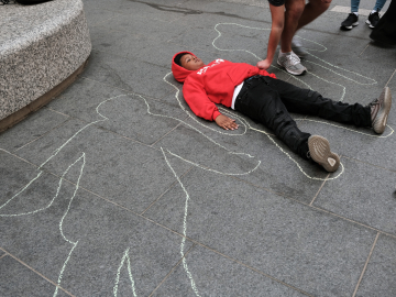 Local teenagers participate in a &quot;Die In&quot; to draw attention to gun violence in Philadelphia, Pennsylvania. April 14. Spencer Platt/Getty
