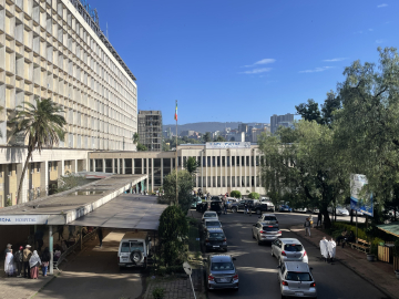 Tikur Anbessa Specialized Hospital, Addis Ababa University medical campus on sunny day with a blue sky background.