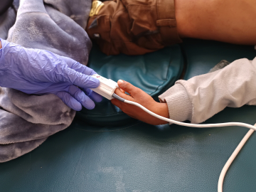 A nurse records vital signs for a measles patient in the Médecins Sans Frontières isolation ward. at Al-Wahda hospital, Dhamar, Yemen. May 27, 2025.