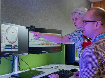 Rhys White, microbial genomics lead at Public Health and Forensic Science, and a colleague review a pangenome graph showing a key antibiotic-resistance gene.