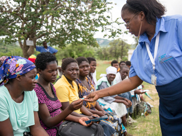 Marie Stopes International nurse Eve Chirengwa shows a client a contraceptive implant during a group counselling session.