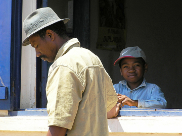 In Madagascar, a father keeps watch outside a health clinic while his son recovers from suspected pneumonic plague (Yersinia pestis).