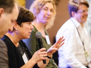 Kelly Henning discusses urban health issues in a 2017 panel in Paris. (Image: Courtesy)