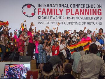 Ugandans take the stage to celebrate winning an ICFP EXCELL Award.