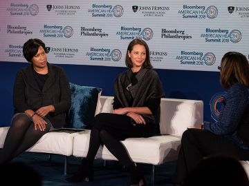 Christy Turlington Burns (center) at the Bloomberg American Health Summit with DC Mayor Muriel Bowser (left) and J. Nadine Garcia, executive vice president and COO of Trust for America’s Health.