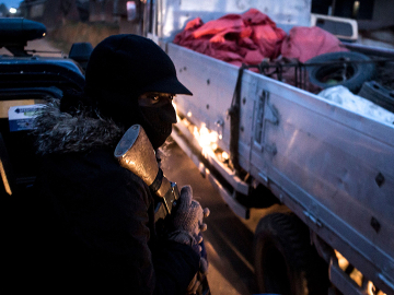 Local police on a May 18 patrol in Butembo, epicenter of the Ebola crisis in DRC and site of attacks on health facilities. (Image: JOHN WESSELS/AFP/Getty Images)