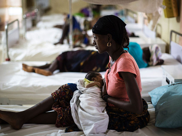 A mother nurses her newborn at the maternity ward of the Kailahun Government hospital on April 26, 2016, eastern Sierra Leone. Image: Marco Longari/AFP/Getty