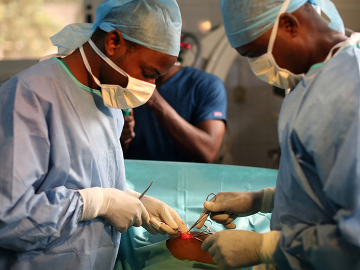 Surgeons operate in a hospital in Sotouboua, Togo. Image: BSIP/Universal Images Group via Getty Images
