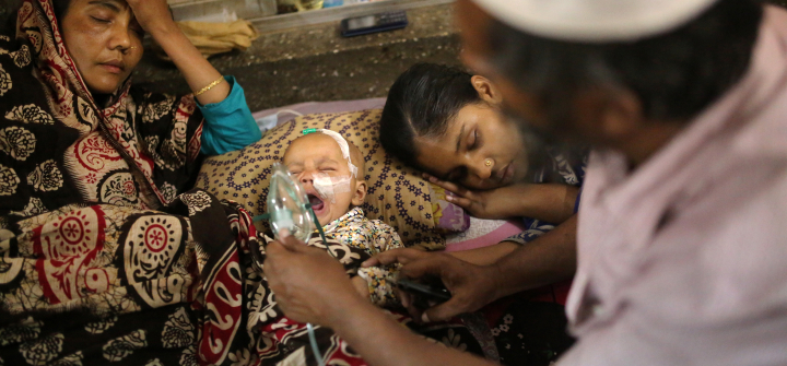 A baby who is suffering from respiratory disease receives treatment inside at Dhaka Shishu Hospital in Dhaka, Bangladesh, February 24, 2021. Syed Mahamudur Rahman/NurPhoto via Getty Images.