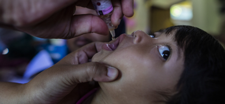 A child looks uncertain as he receives a polio vaccine at a health care center in Bogor, West Java, Indonesia, on April 3, 2023. Aditya Aji/AFP via Getty 