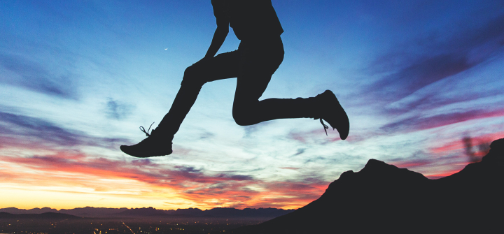 A silhouetted youth leaps across a sunset in Cape Town, South. Africa. Joshua Earle / unsplash