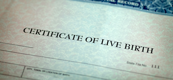 A photograph of a birth certificate.