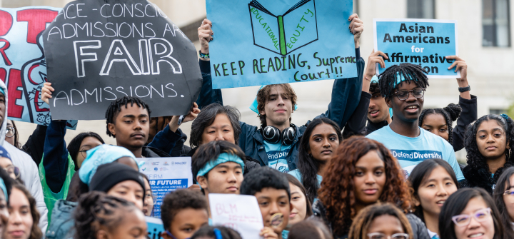 A diverse group of young people hold signs during a rally in support affirmative action policies outside the US Supreme Court in Washington, D.C., October 31, 2022. Eric Lee/The Washington Post/Getty Images