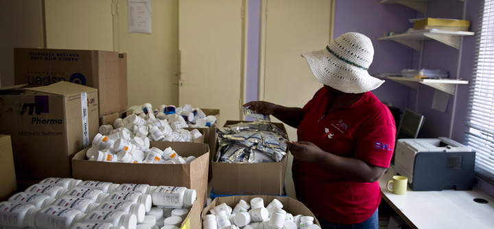 A health worker manages supplies in a PEPFAR-funded AIDS clinic in Johannesburg, South Africa, on January 27, 2012