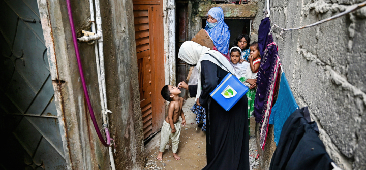 A health worker administers polio drops to a child on the first day of a nationwide week-long poliovirus eradication campaign in Karachi, Pakistan, on September, 1, 2025