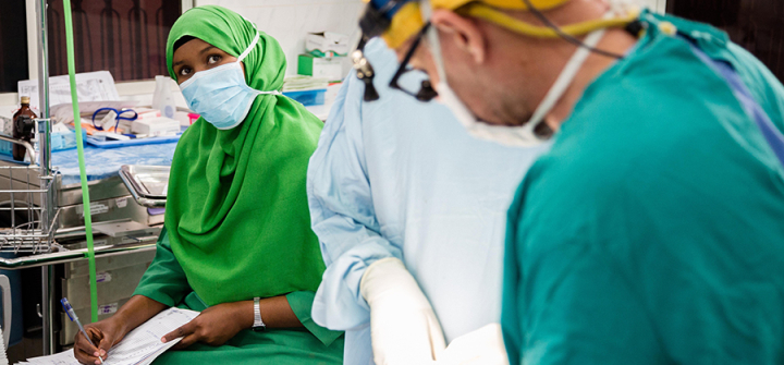 Hamda Mohamed Omar (left), a nurse anesthetist/trainer from Edna Adan hospital in Hargeisa, at work with a visiting surgeon. 