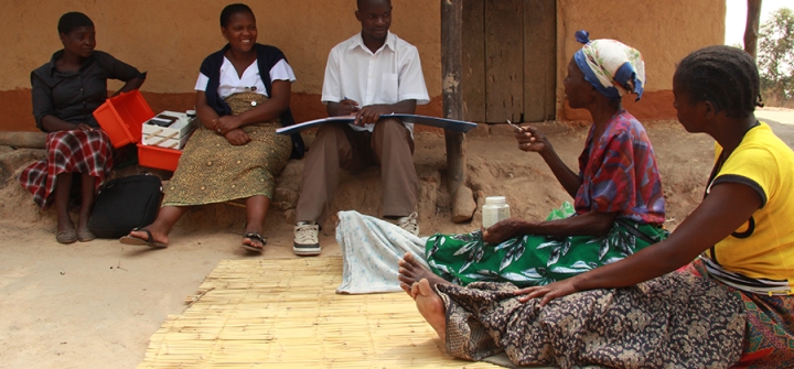 The Partners In Health palliative care team conducts a home visit with a patient in Neno District, Malawi. 