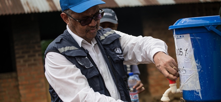 WHO Director-General Tedros Adhanom Ghebreyesus washes his hands before visiting an Ebola treatment center in Itipo on June 11, 2018.