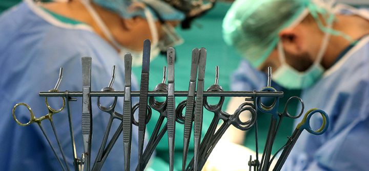 Operating tools are seen as pediatric heart surgeon Issam al-Rassi performs a heart operation on 9-month-old Syrian refugee Amena al-Helou at the Hammoud Universal Hospital in Sidon, Lebanon, Sept. 2016.