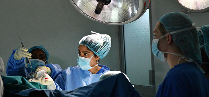 Surgeons are at work during restorative surgery on a survivor of female genital mutilation in Nairobi, Kenya on May 11, 2017. 