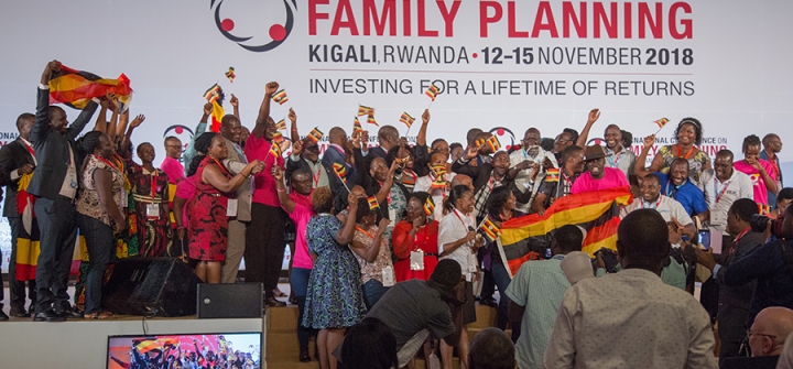 Ugandans take the stage to celebrate winning an ICFP EXCELL Award.