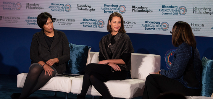 Christy Turlington Burns (center) at the Bloomberg American Health Summit with DC Mayor Muriel Bowser (left) and J. Nadine Garcia, executive vice president and COO of Trust for America’s Health. 