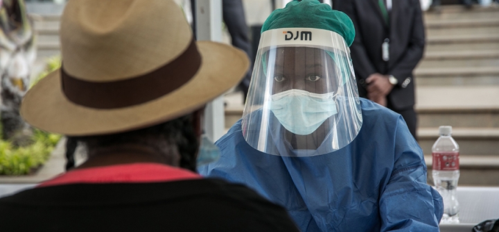 A health care worker tests for COVID-19 yesterday in Antananarivo, Madagascar. Photo by RIJASOLO/AFP via Getty Images