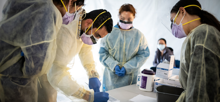 Doctors test hospital staff in a tent outside St. Barnabas hospital in in New York City on March 24, 2020. Photo: Misha Friedman/Getty Images