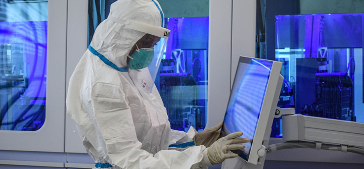 A technician handles samples from truck drivers testing for COVID-19 at the Kenya Medical Research Institute, May 14, 2020. Image: Brian Ongoro/AFP/Getty