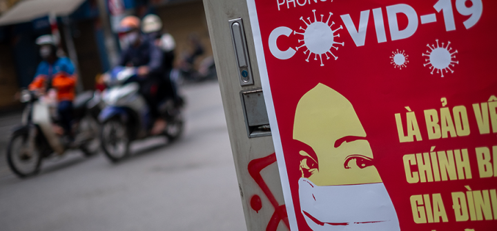 A poster in Hanoi, Vietnam reminds people to take protective measures against COVID-19, April 1, 2020 in Hanoi, Vietnam. Image: Linh Pham/Getty