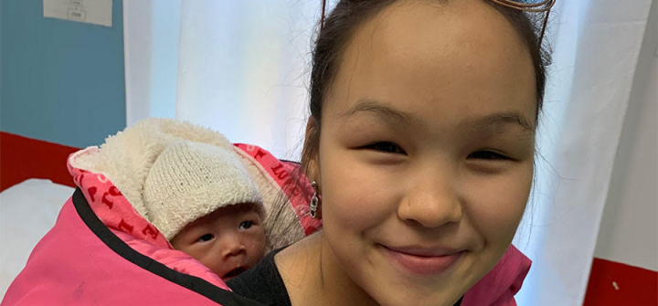 A mother and her newborn who was delivered at the Inukjuak Maternity amidst rising COVID-19 restriction in Nunavik, Quebec, September 2020. Image by Patrice Latka.