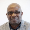 Headshot of Moses John Bockarie, PhD, FRCP is the regional director for Africa at the European & Developing Countries Clinical Trials Partnership