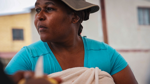 Aletta Seima, wearing a turquoise shirt