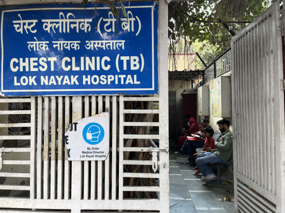People wait outside the tuberculosis clinic at Lok Nayak hospital.