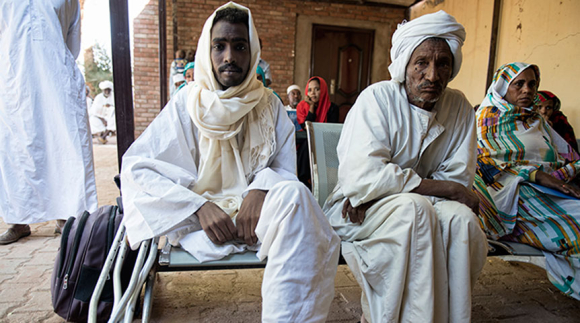Man with mycetoma and his father