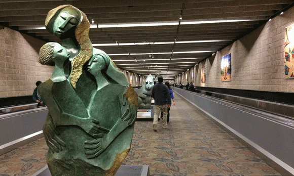 Atlanta's Hartsfield airport sculptures from Zimbabwe welcome ASTMH attendees.