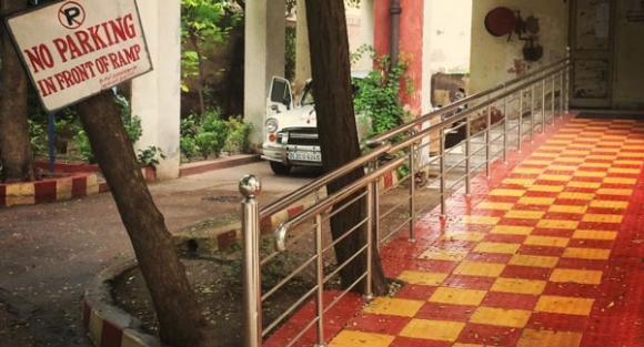 Wheelchair ramps are not often seen in many Indian cities, and those that are available are often too steep for independent use.  This ramp, which is appropriately sloped, is at the Office of the Chief Commissioner for Persons with Disabilities.  