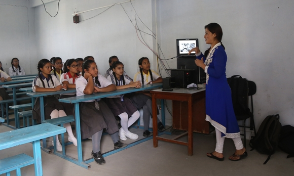Padma Maharjan teaching a prevention class at Mangal Secondary School, Kirtipur