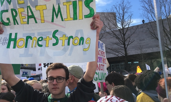 A student from Great Mills High School in Southern Maryland, which suffered its own shooting this week which claimed two lives, joins the protest. (Image: Joanne Cavanaugh Simpson)