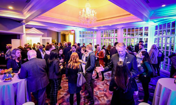 Bloomberg American Health Summit attendees work in a little networking around the sessions.