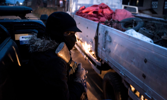 Local police on a May 18 patrol in Butembo, epicenter of the Ebola crisis in DRC and site of attacks on health facilities. (Image: JOHN WESSELS/AFP/Getty Images)