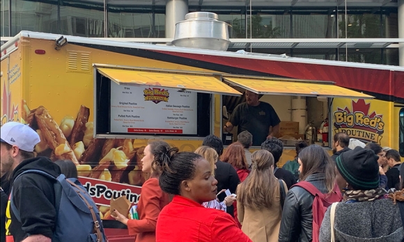 A food truck sells poutine at Women Deliver's Culture Night in Vancouver.