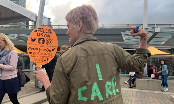 Samantha Monckton, of March on Vancouver, handed out period supplies for #WD2019 attendees at Culture Night.