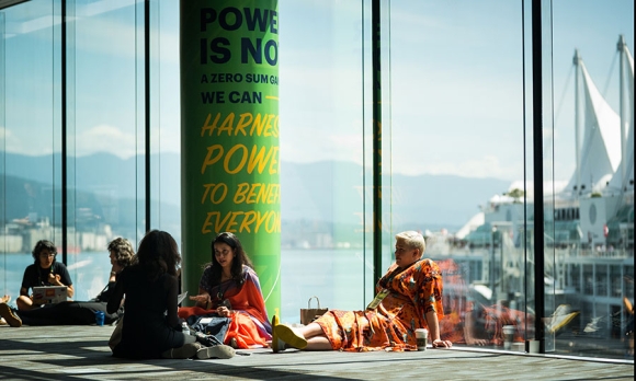 Attendees relax between sessions in the Vancouver Convention Centre for Women Deliver 2019